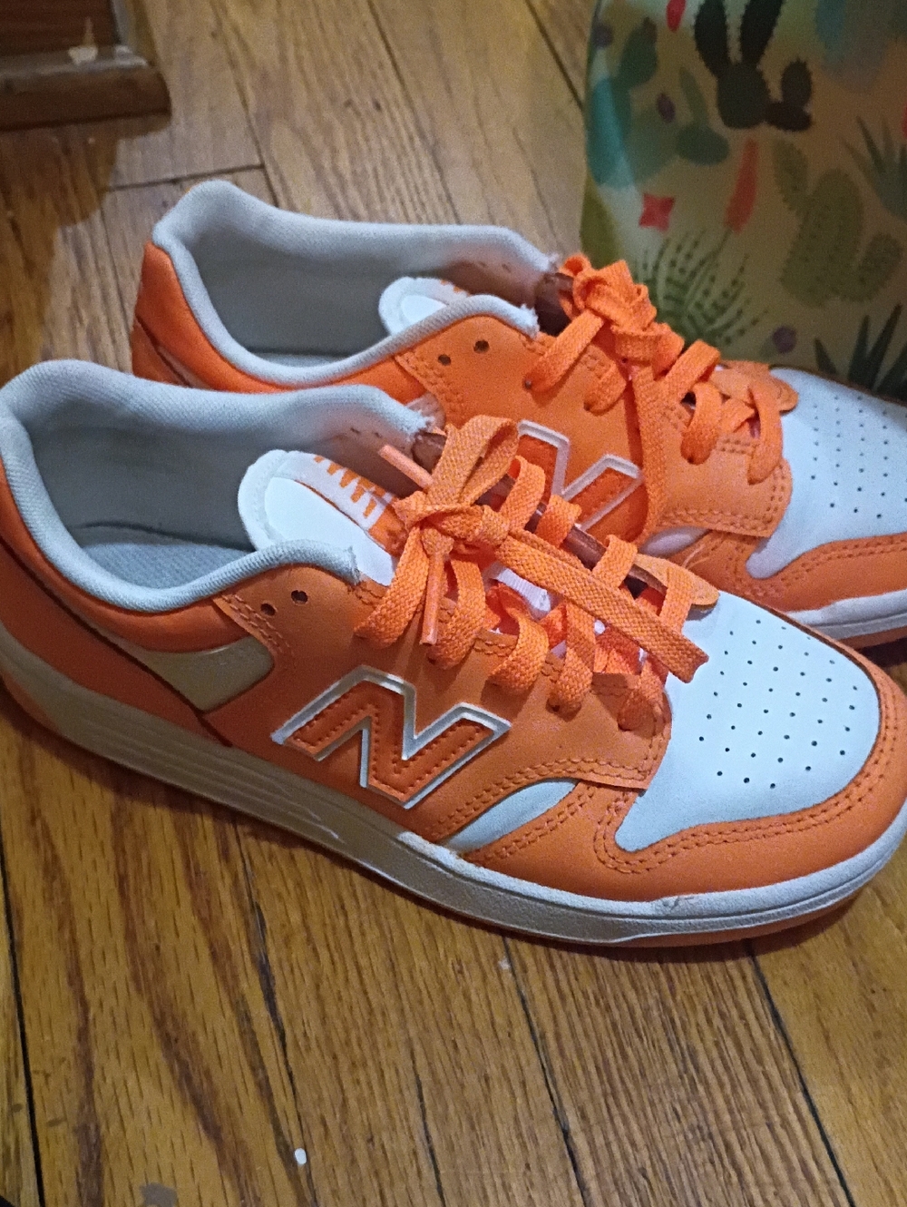 New Balance Orange and White Low-Top Sneakers